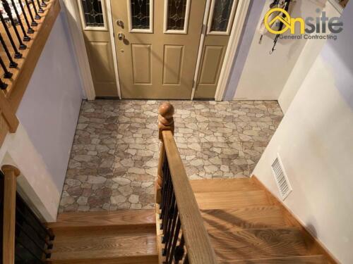 Entry way natural stone installation, porcelain material